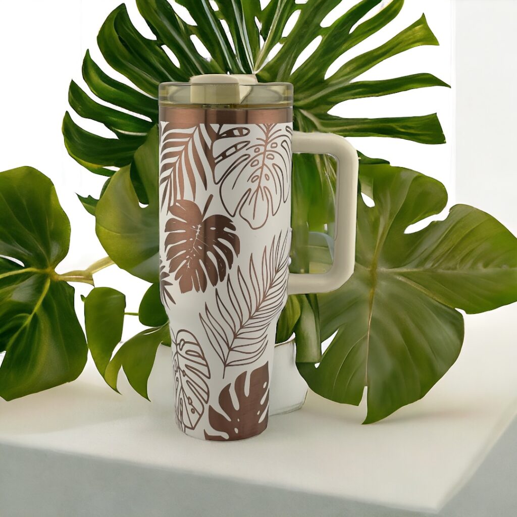 Cream 40 oz Tumbler with Copper engraving of Monstera Leaves